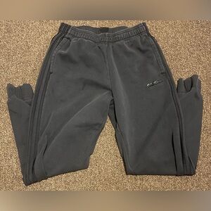 Black adidas sweatpants.